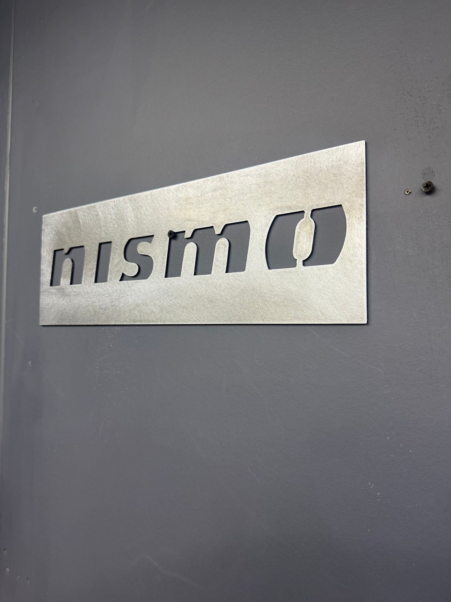 NISMO metal sign